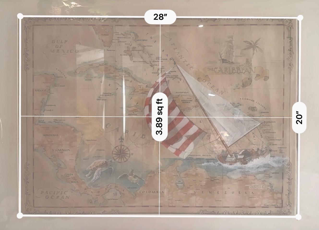 Framed size reference of Caribbean sailing sloop nautical chart artwork, 28 by 20 inches